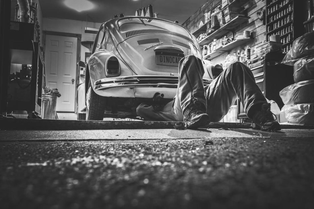 A vehicle being serviced in a workshop